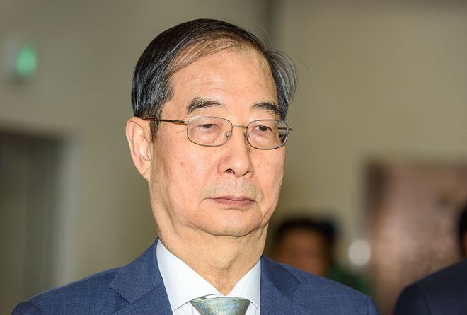 韩国代总统韩德洙宣布辞职，背后原因及影响